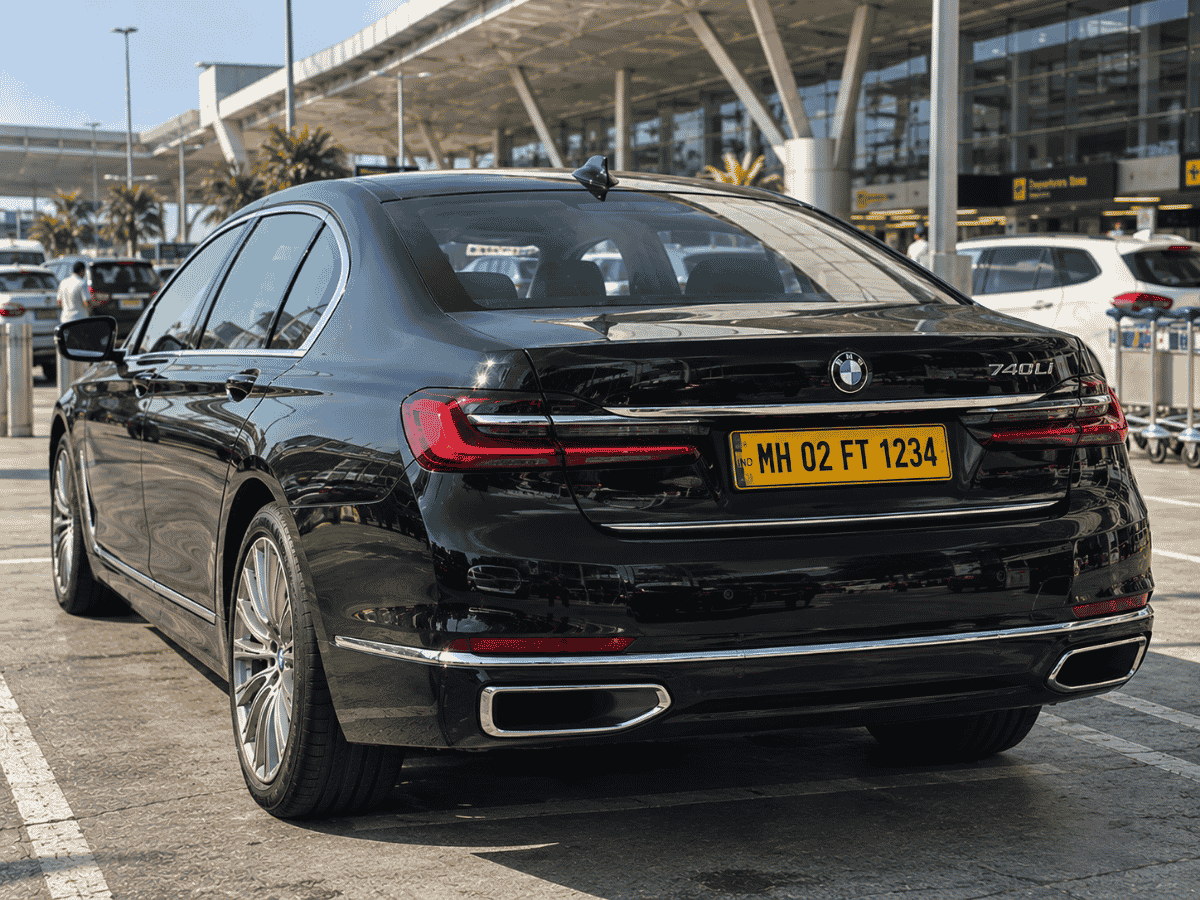 Luxury rental car with black and yellow commercial number plate in Goa